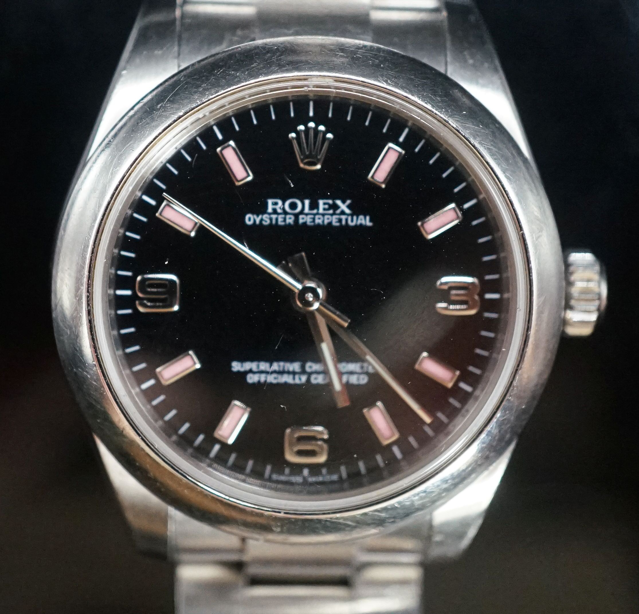 A lady's modern stainless steel Rolex Oyster Perpetual wrist watch, on a stainless steel Rolex bracelet, case diameter 31mm, no box or papers.